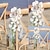 preiswerte Künstliche Blumen-Künstliche Blume, Hochzeitsdekoration im Freien, Stuhllehnenblume, weiße künstliche Blume, die an die Blume gelehnt ist